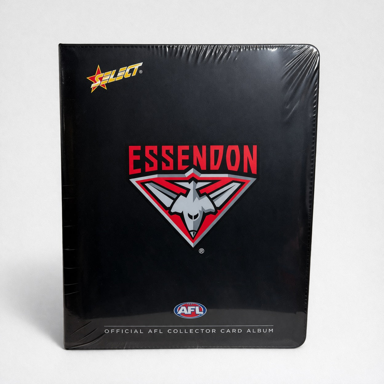 Select Essendon AFL trading card album on white background